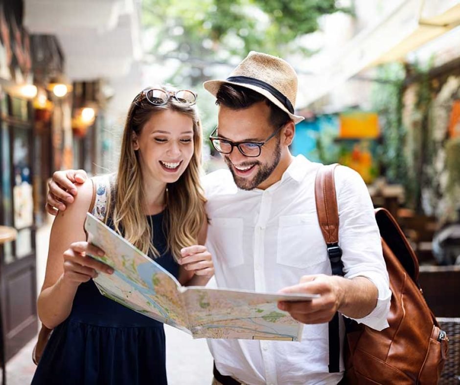 tourist-couple-traveling-travel-walking-on-street-small.jpg